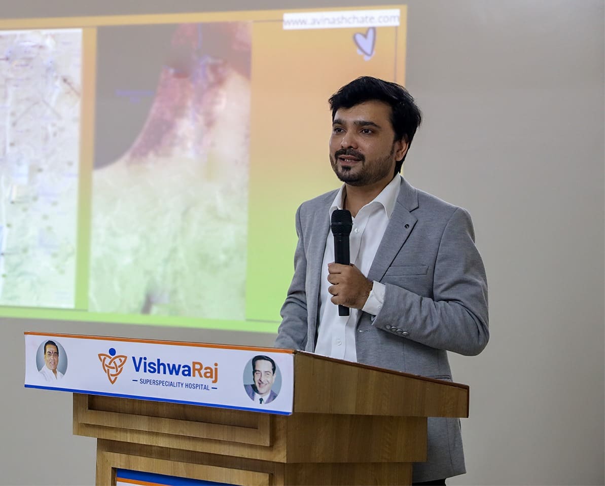 Avinash Chate speaking at a corporate event in Pune